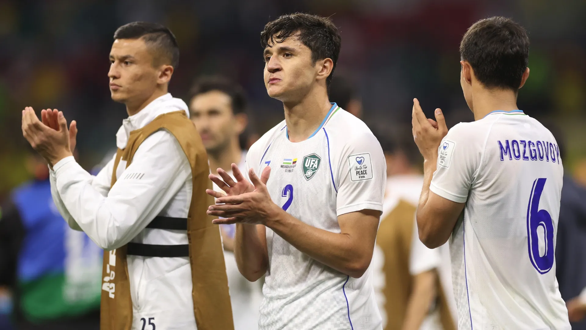 Abdukodir Khusanov and players of Uzbekistan – Carl Recine/Getty Images