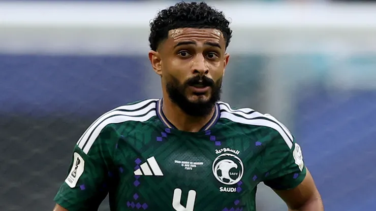 Abdulelah Al-Amri #4 of Saudi Arabia runs with the ball.