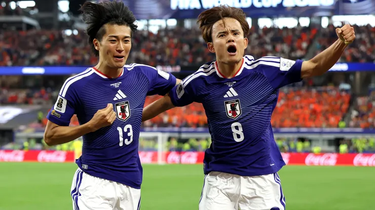 Keito Nakamura (L) of Japan celebrates with Takefusa Kubo (R)