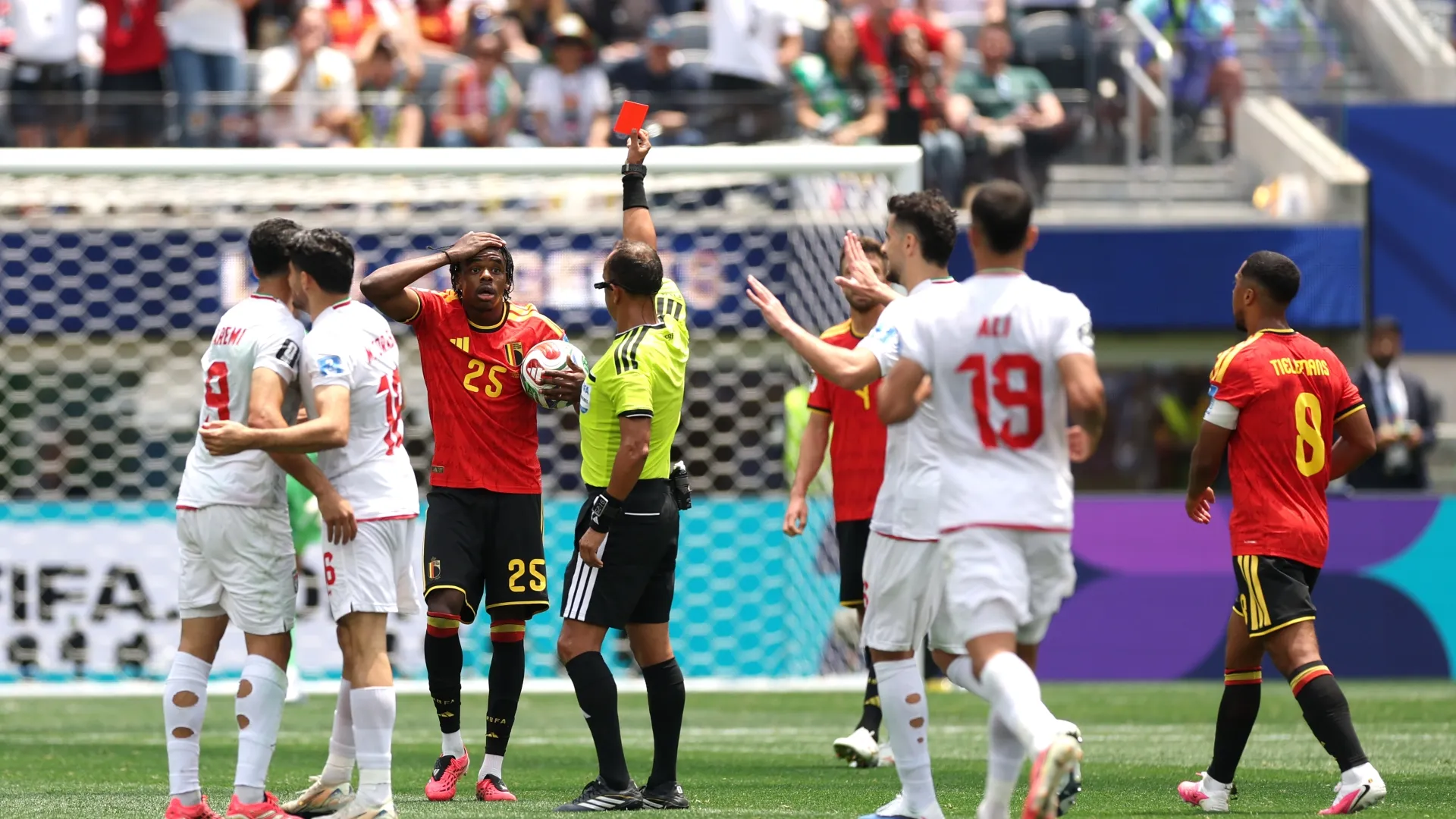 Nathan Ngoy of Belgium receives a red card by Referee Dario Herrera (Getty Images/Jamie Squire)