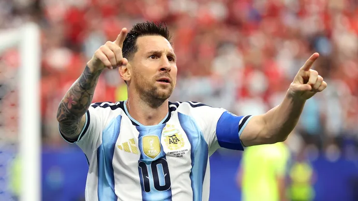 Lionel Messi celebrates his record-breaking goal against Austria.