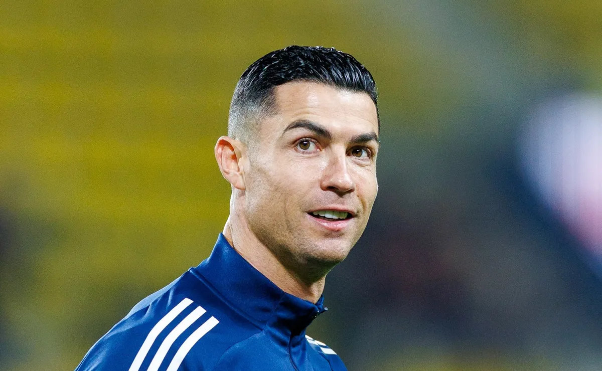 Cristiano Ronaldo reaches out to a young Venezuelan boy following a ...
