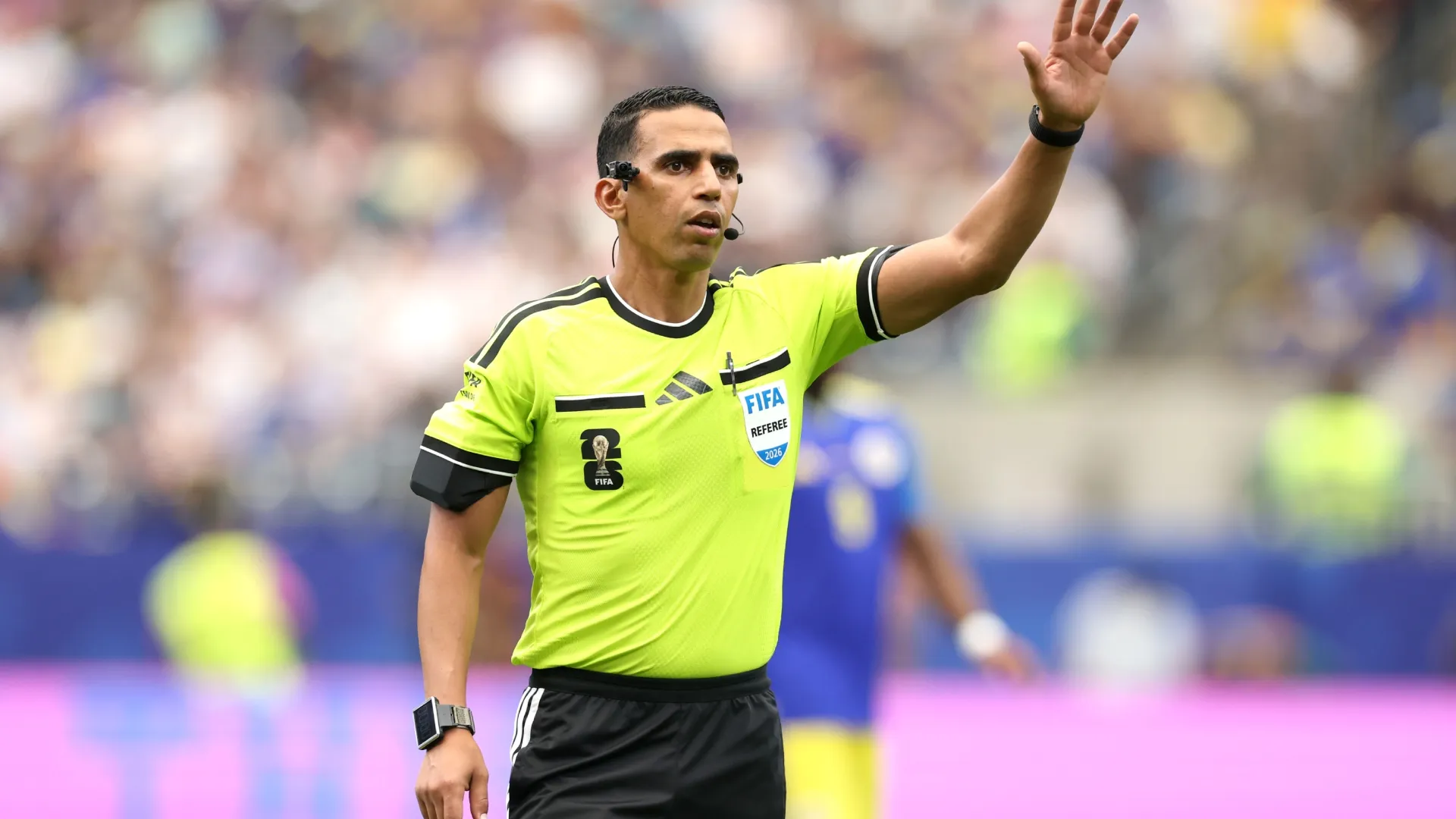 Jalal Jayed makes a call during the FIFA World Cup 2026 Group E match (Source: Alexander Hassenstein/Getty Images)