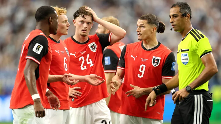 Players of Austria protest to Referee Amin Mohamed Omar during the FIFA World Cup 2026 Group J match