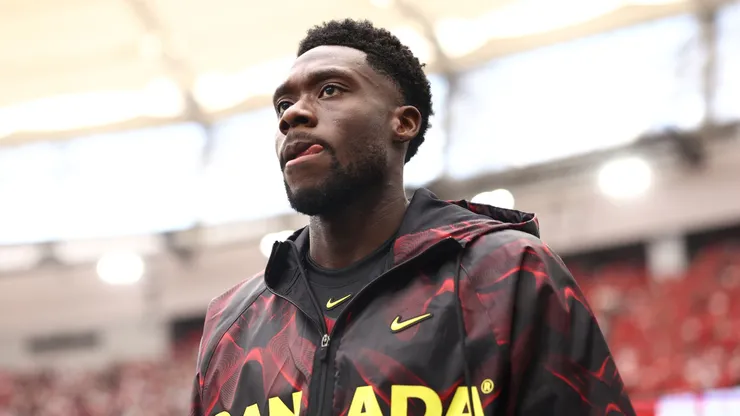 Alphonso Davies #19 of Canada walks into the pitch.