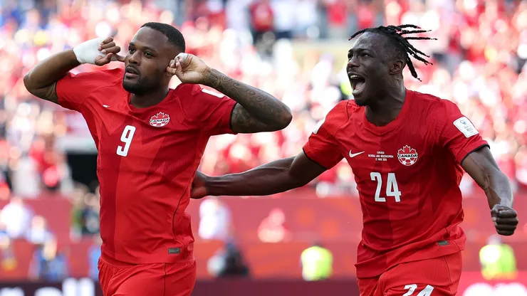 Cyle Larin of Canada celebrates with Promise David during the FIFA World Cup 2026 Group B match