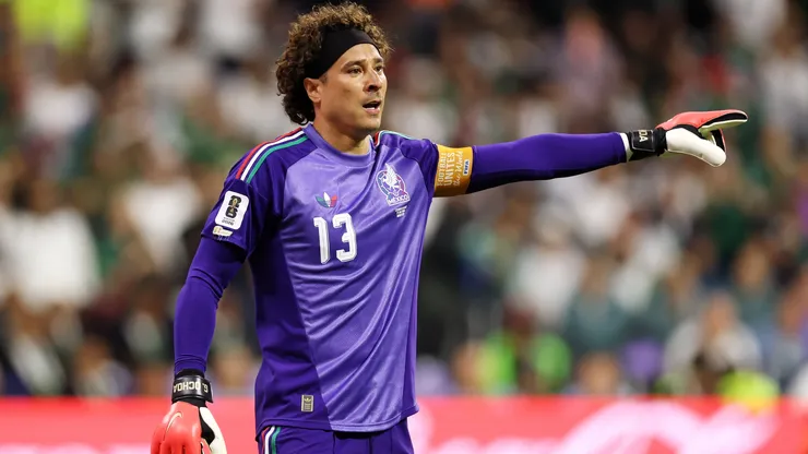 Guillermo Ochoa #13 of Mexico looks on.