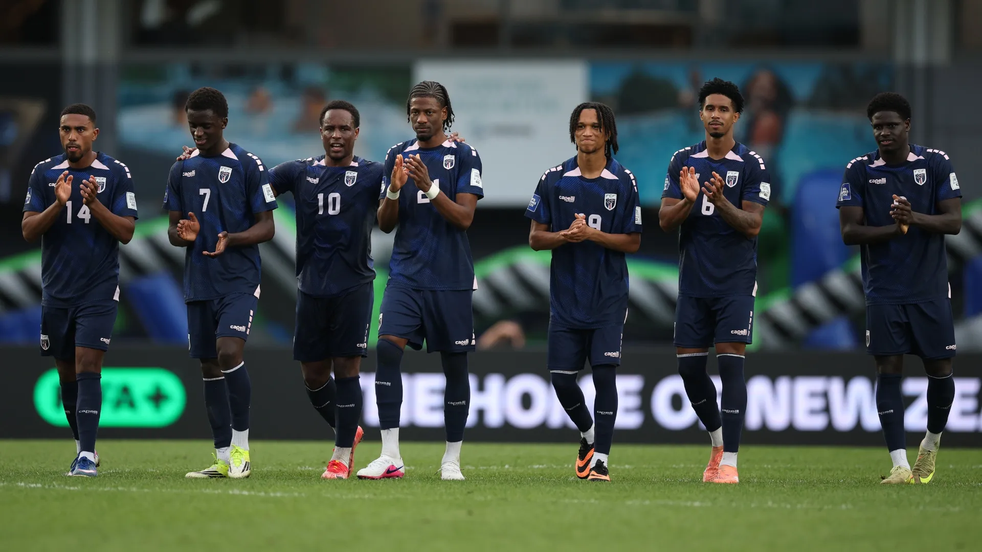 Members of Team Cape Verde celebrate winning the match. Phil Walter/Getty Images