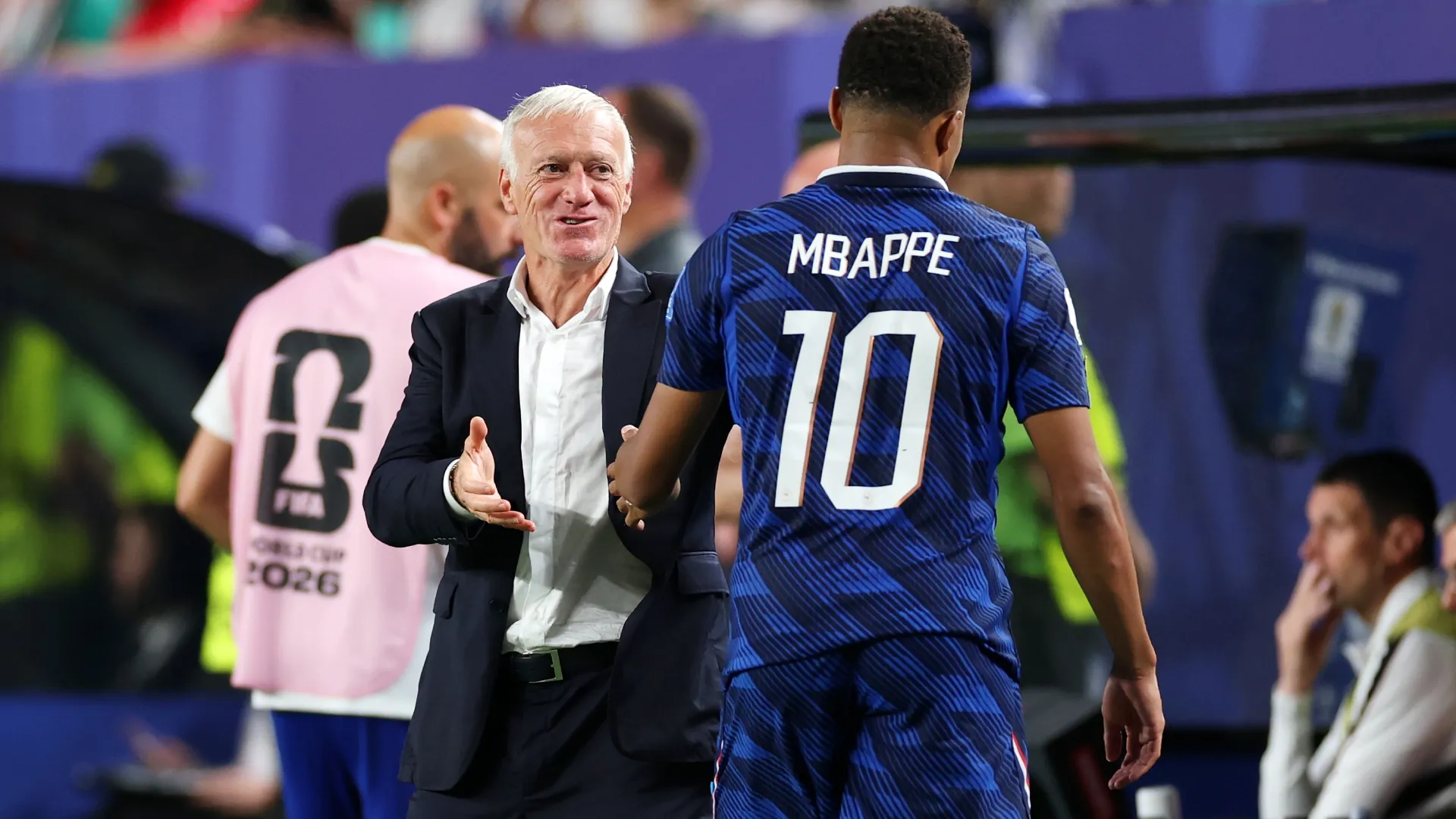 Kylian Mbappe is congratulated by Didier Deschamps during the FIFA World Cup 2026 Group I (Source: Dan Mullan/Getty Images)