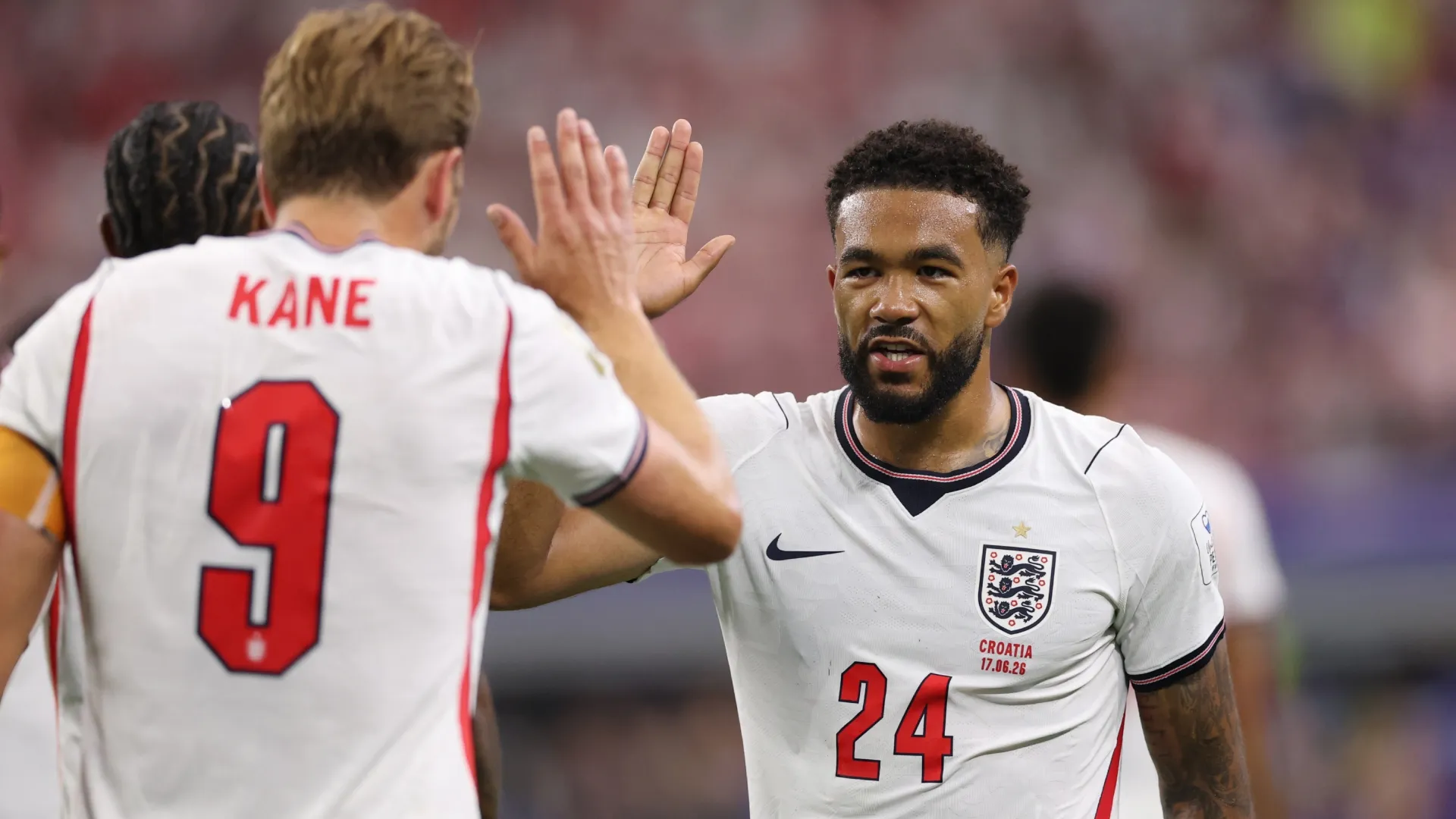 Harry Kane #9 and Reece James #24 of England high five during the FIFA World Cup 2026 . Michael Steele/Getty Images