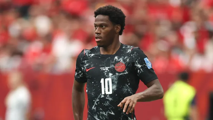 Jonathan David #10 of Canada controls the ball during the FIFA World Cup 2026 Group B match.