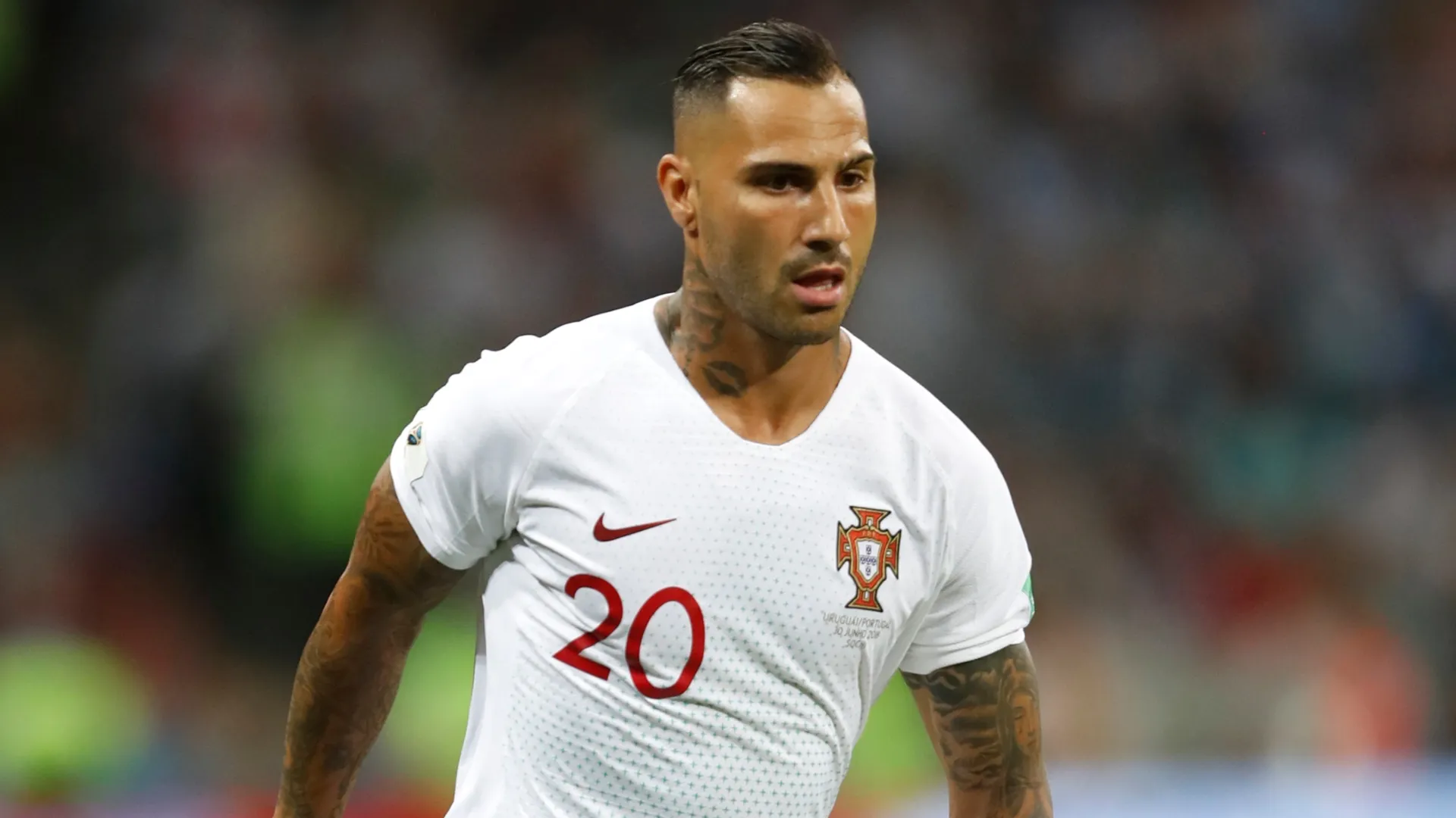 Ricardo Quaresma looks on