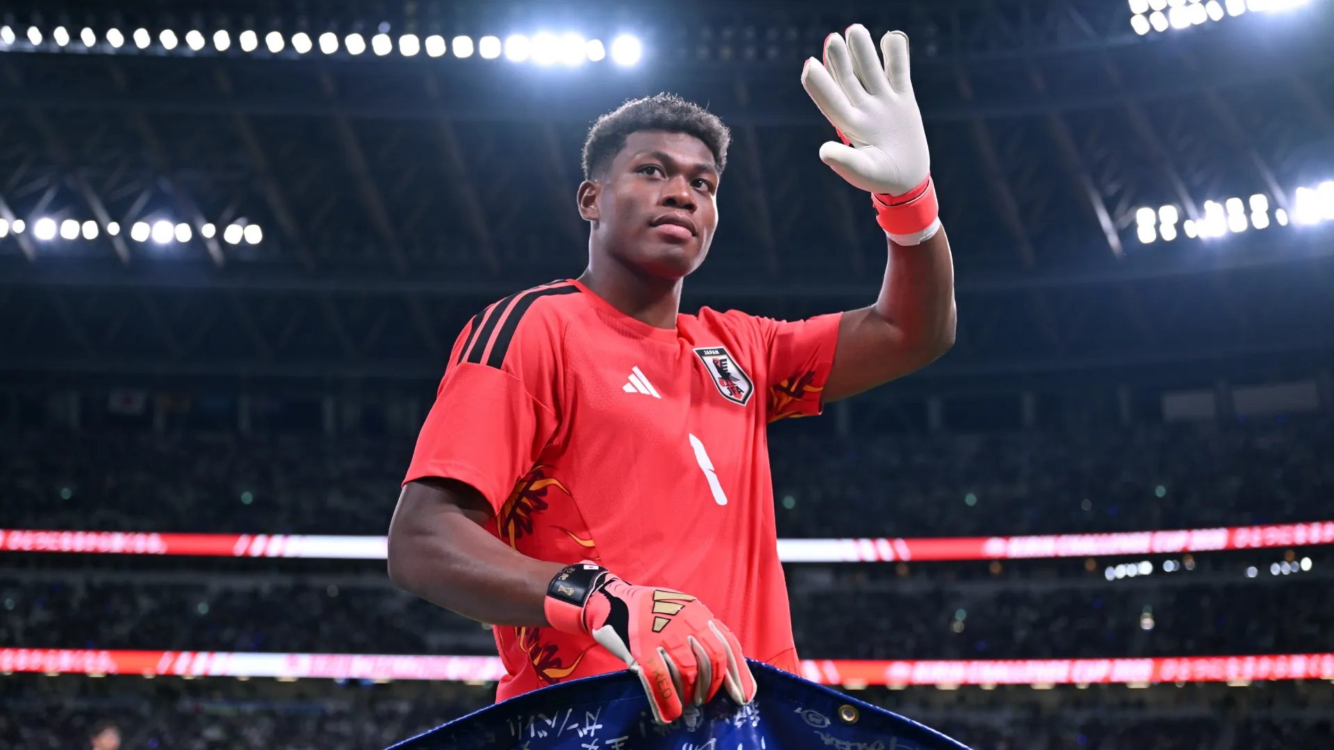 Zion Suzuki of Japan applauds fans after the international friendly match (Source: Kenta Harada/Getty Images)