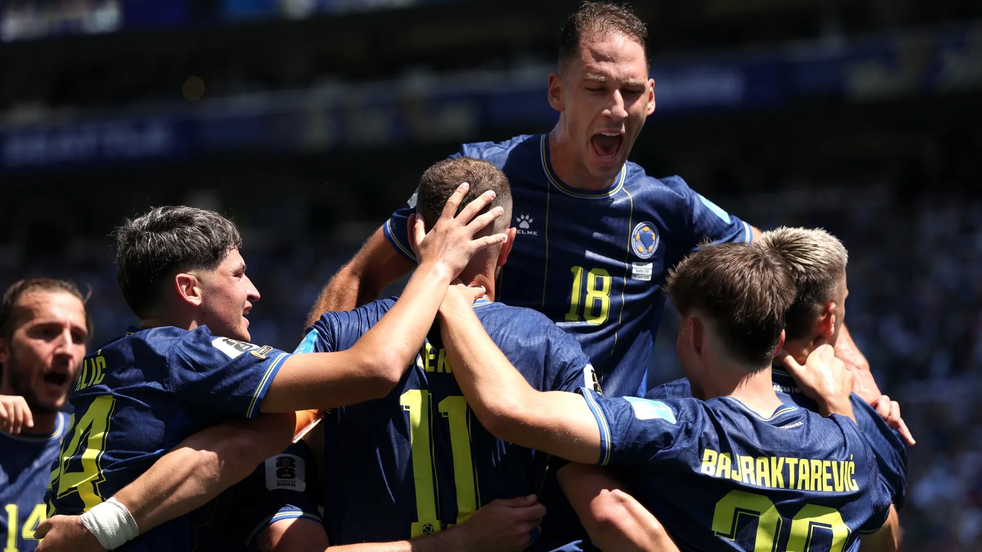 Bosnia and Herzegovina players celebrate after an own goal by Sultan Albrake #18 of Qatar.Stu Forster/Getty Images)