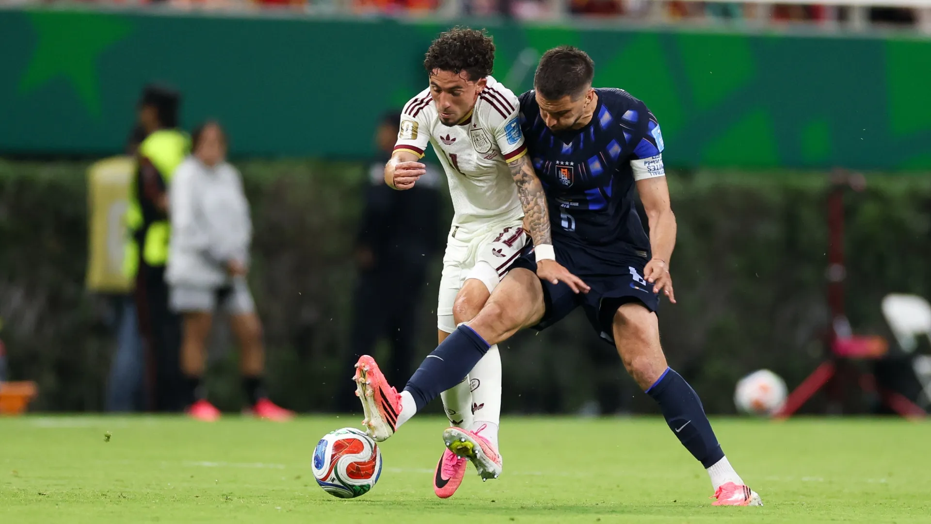Yeremy Pino #11 of Spain challenged by Brian Rodriguez #18 of Uruguay. Florencia Tan Jun/Getty Images