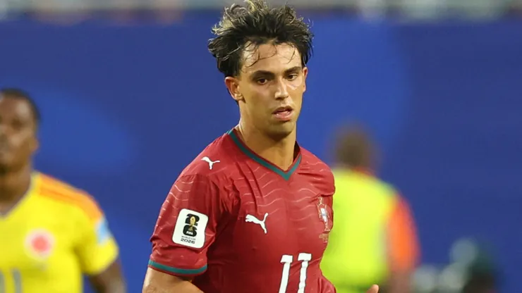 Joao Felix #11 of Portugal runs with the ball.