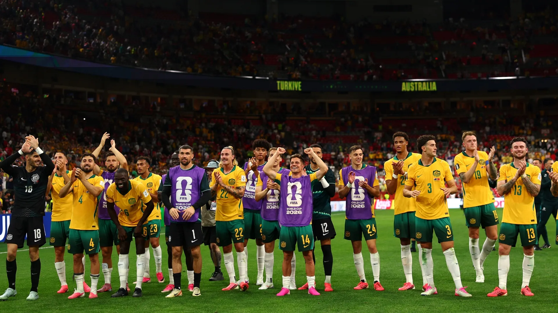 Players of Australia celebrate in front of the fans. Dean Mouhtaropoulos/Getty Images