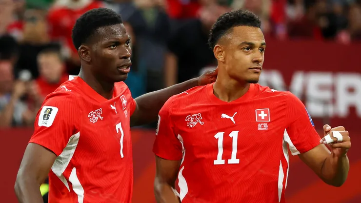 Breel Embolo #7 of Switzerland celebrates with Dan Ndoye #11