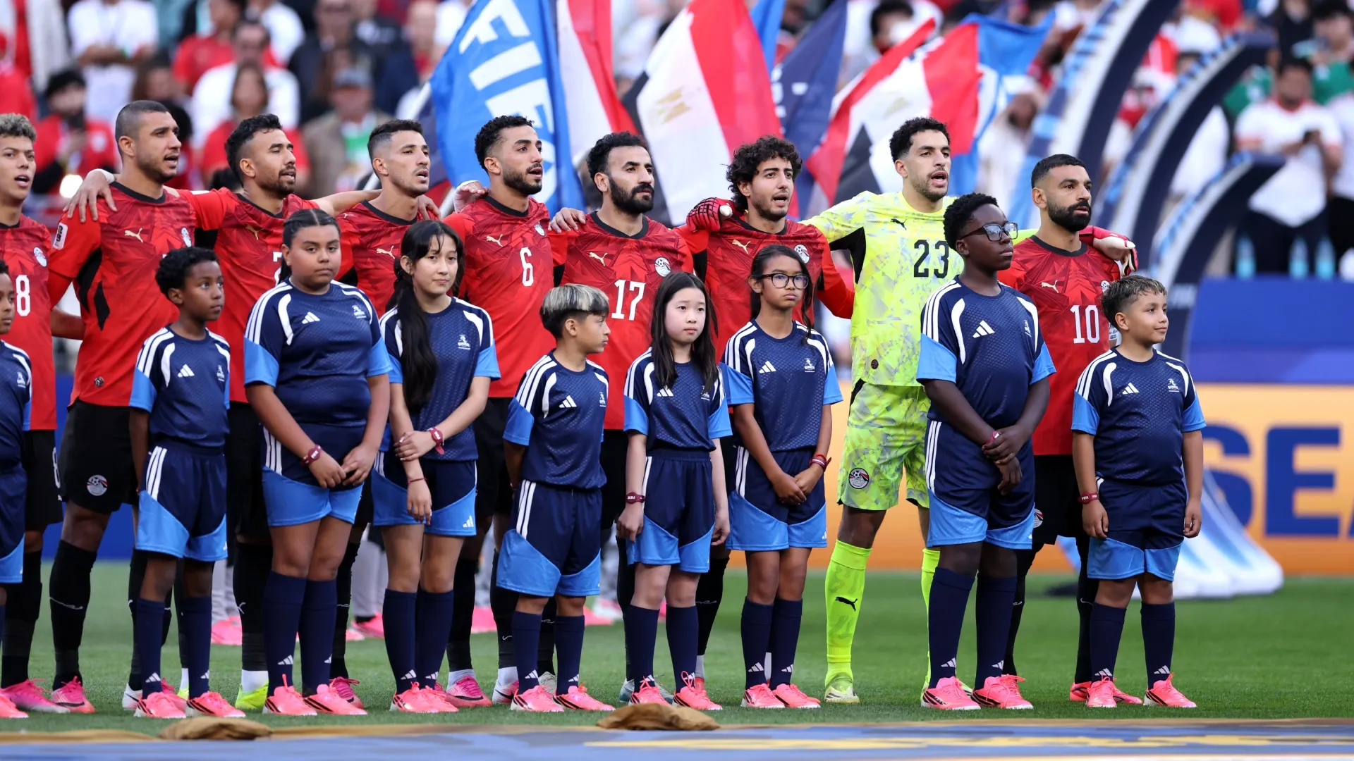 Mohamed Salah #10 of Egypt and teammates stand for the national anthem. Richard Heathcote/Getty Images