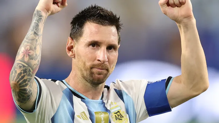 Lionel Messi #10 of Argentina acknowledges fans after the 3-2 win.