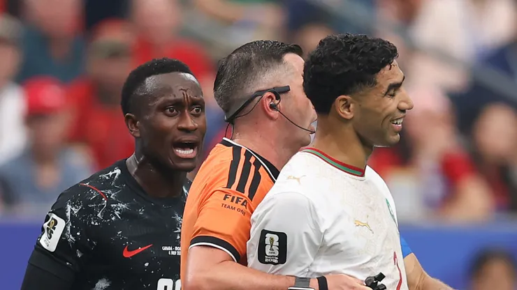 Richie Laryea of Canada and Achraf Hakimi of Morocco