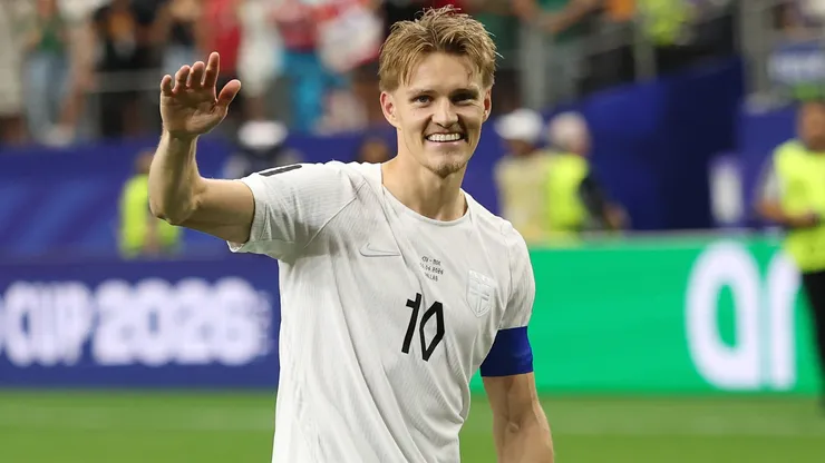 Martin Odegaard #10 of Norway celebrate with fans.