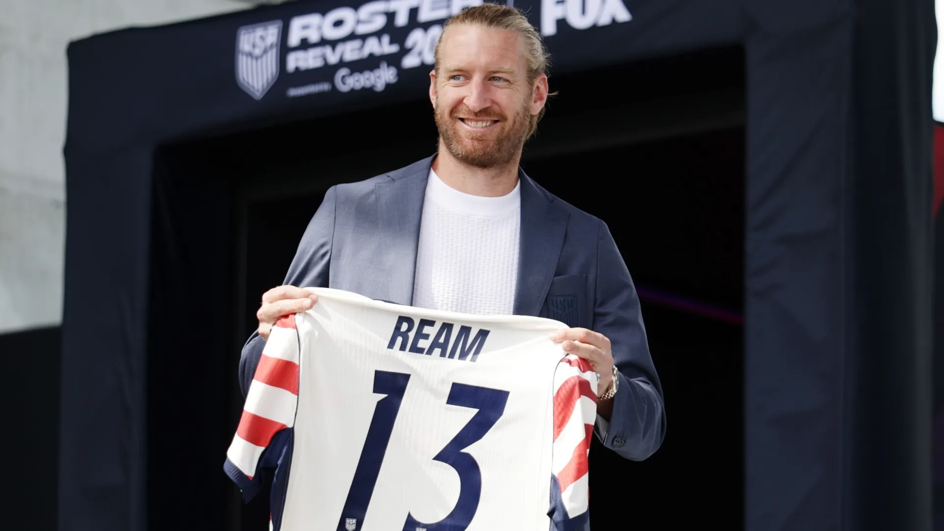 Tim Ream poses with his jersey during the United States World Cup roster (Source: Adam Hunger/Getty Images)