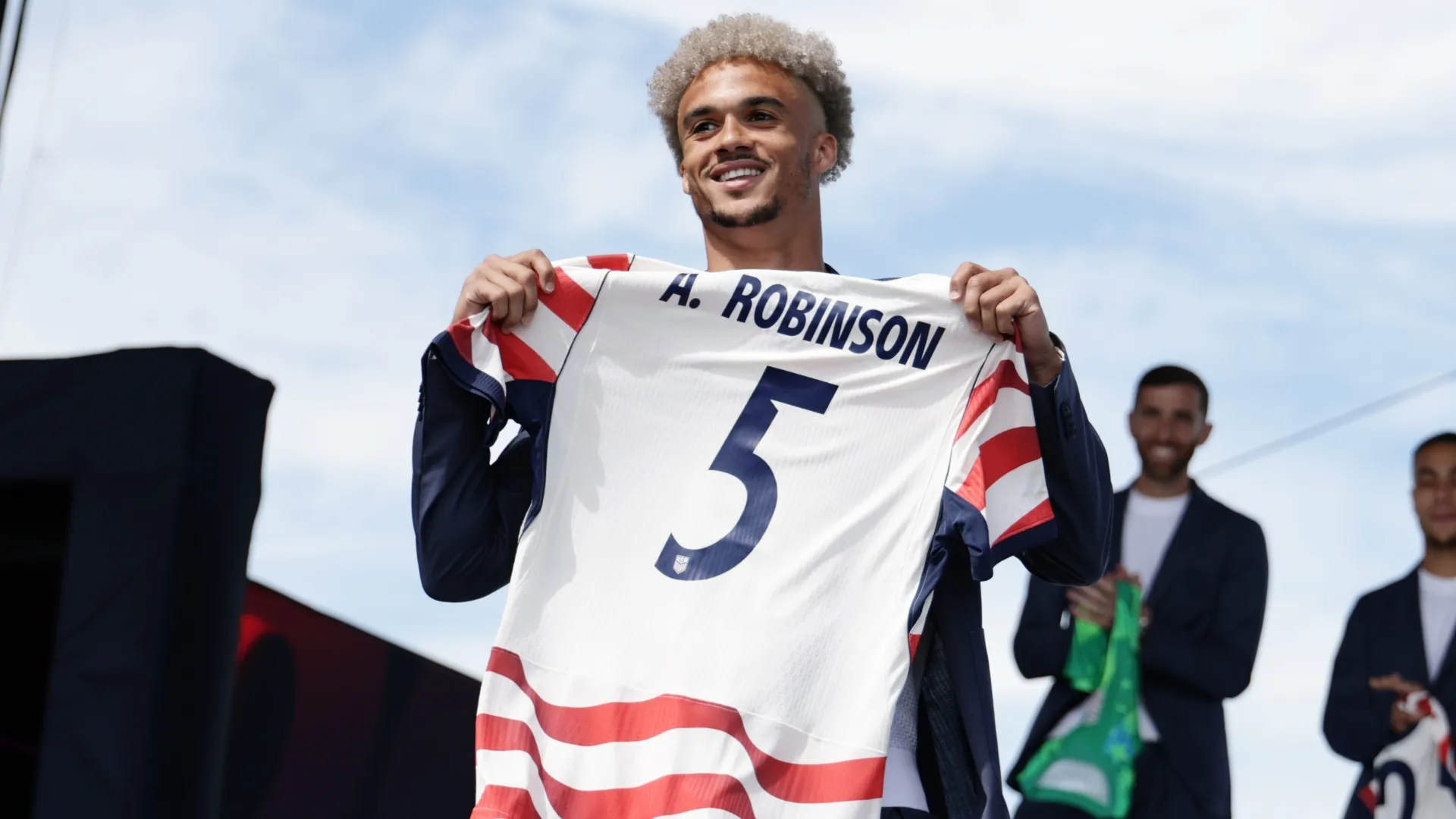 Antonee Robinson poses with his jersey during the United States World Cup roster (Source: Adam Hunger/Getty Images)