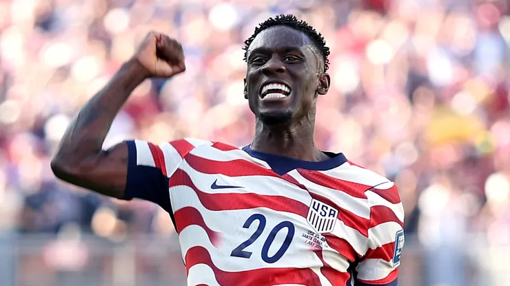 Folarin Balogun #20 of the United States celebrates scoring his team's first goal.