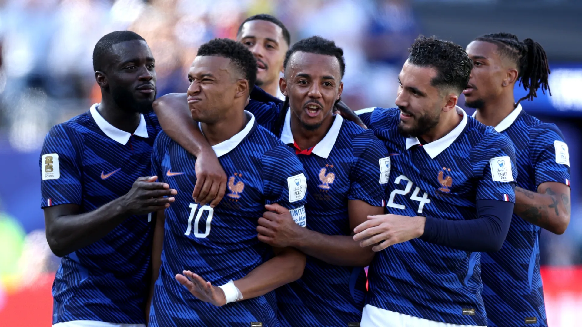 Kylian Mbappe #10 of France celebrates with teammates. Dan Mullan/Getty Images