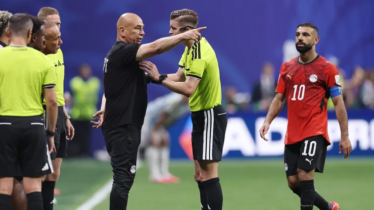 Hossam Hassan, Head Coach of Egypt, argues with referee Francois Letexier.