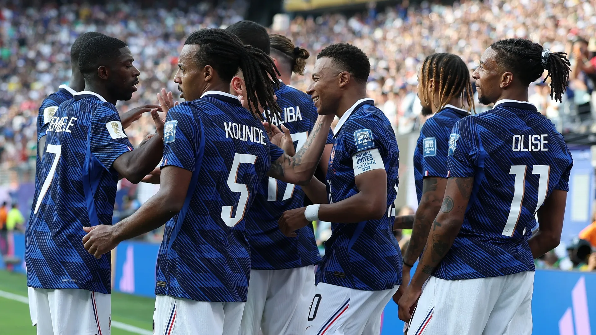 Kylian Mbappe #10 of France celebrates with his team. Al Bello/Getty Images