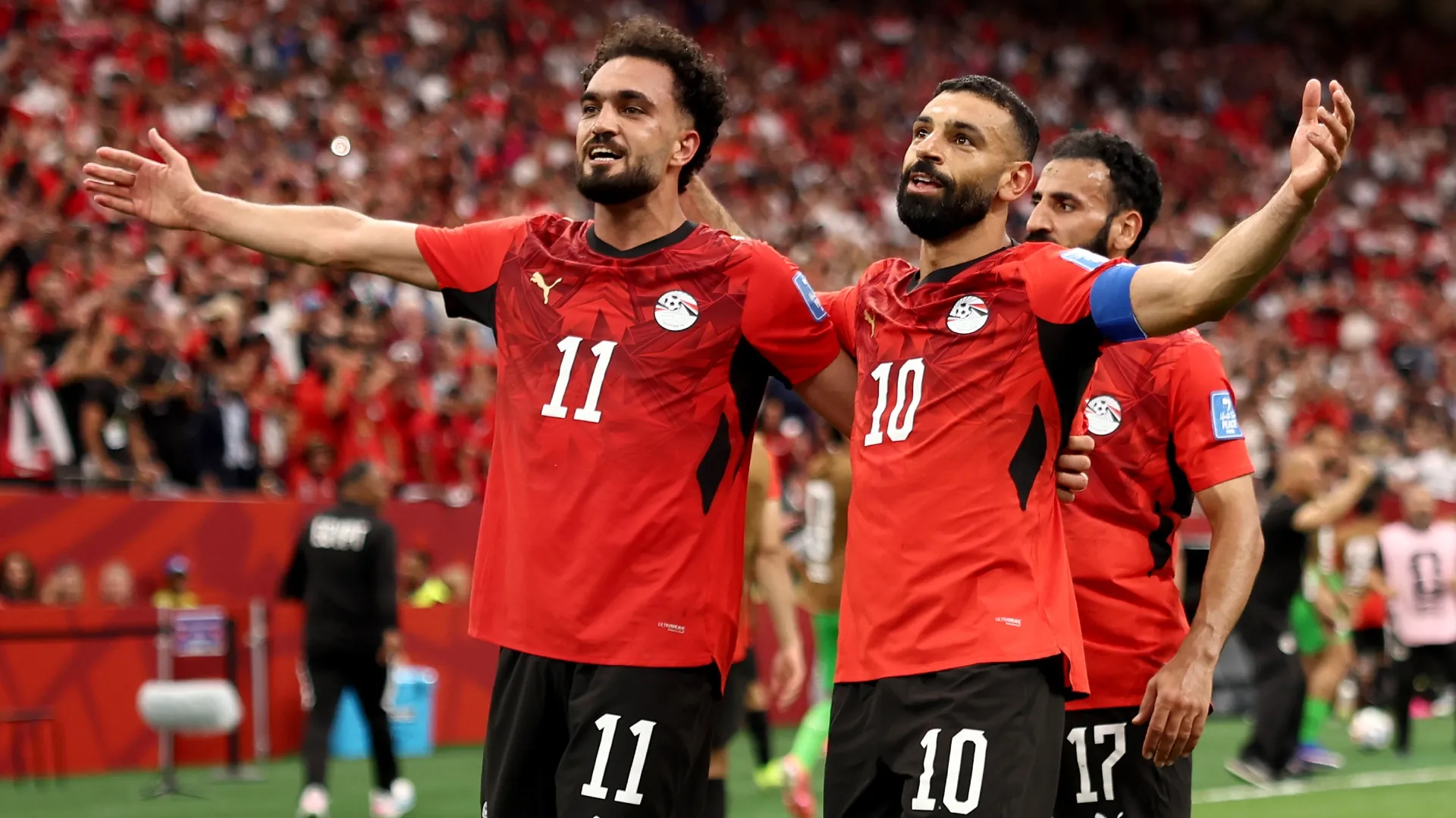 Mohamed Salah of Egypt celebrates with Mostafa Zico. Fran Santiago/Getty Images