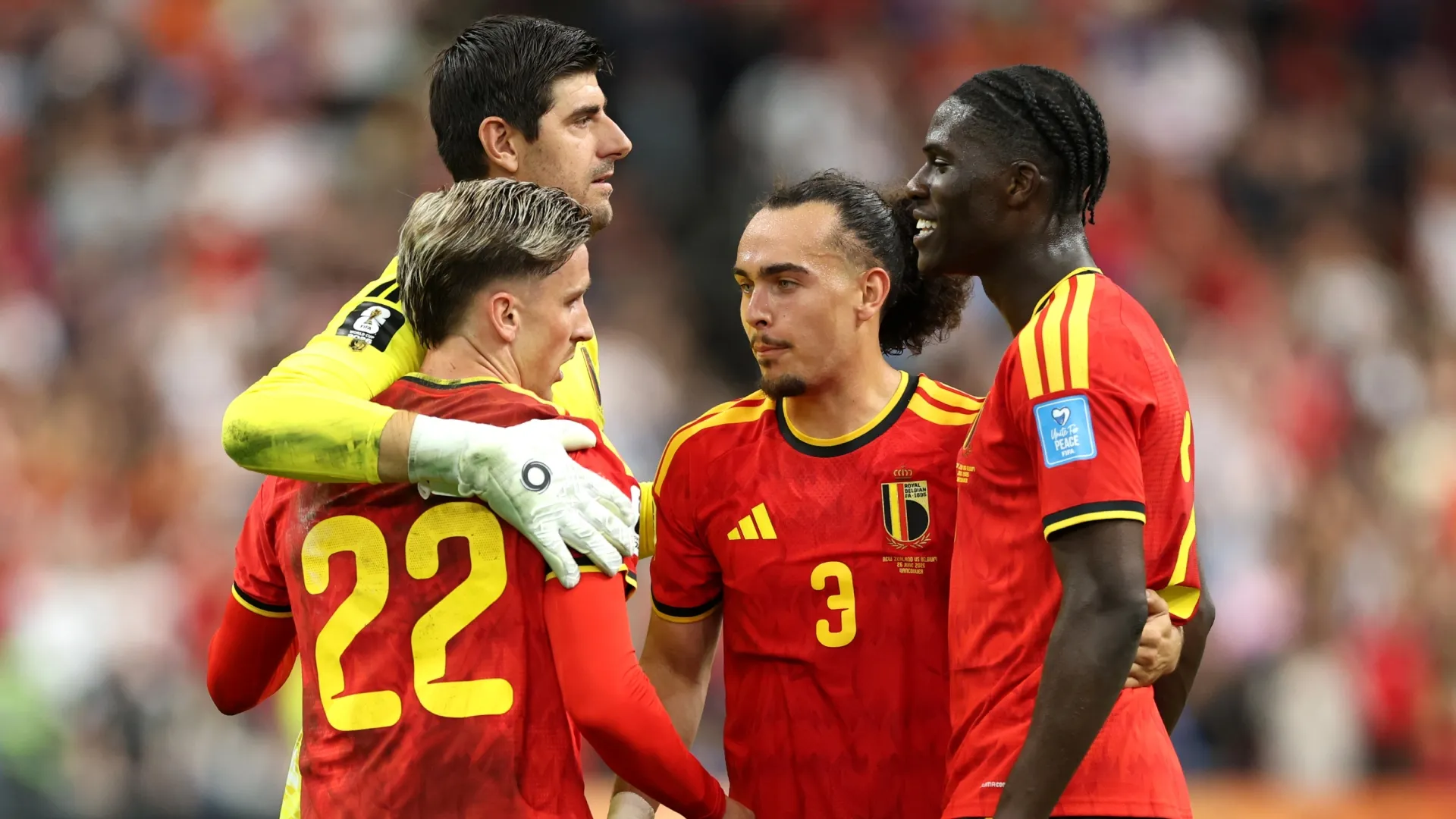L-R) Alexis Saelemaekers, Thibaut Courtois #1, Arthur Theate and Amadou Onana of Belgium. Emilee Chinn/Getty Images