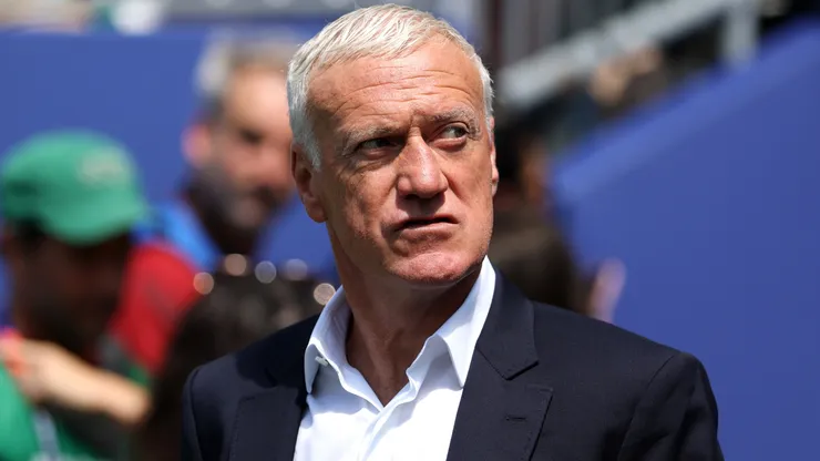 Didier Deschamps, Head Coach of France, inspects the pitch.