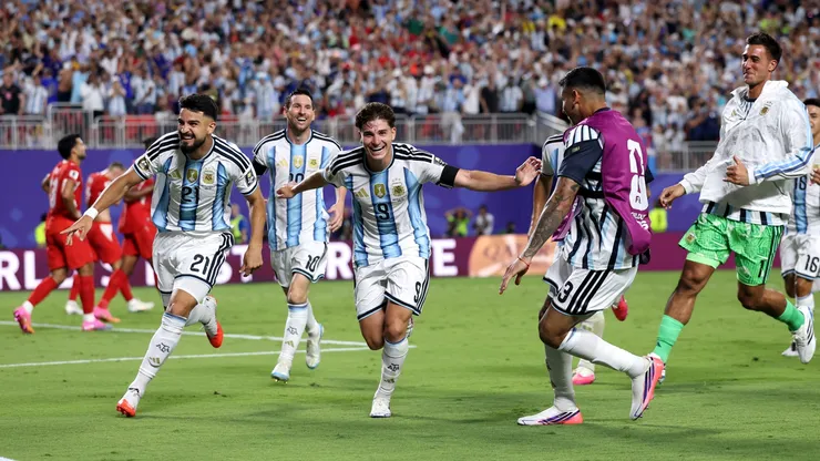 Julian Alvarez #9 of Argentina celebrates with teammates.