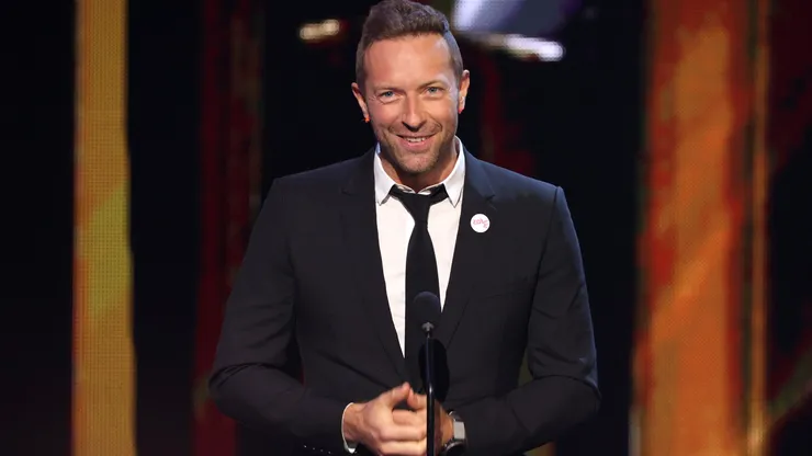 Chris Martin speaks onstage at the 2021 iHeartRadio Music Awards