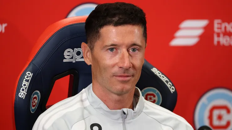 Robert Lewandowski #9 speaks to the media.