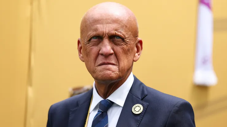 Pierluigi Collina looks on.