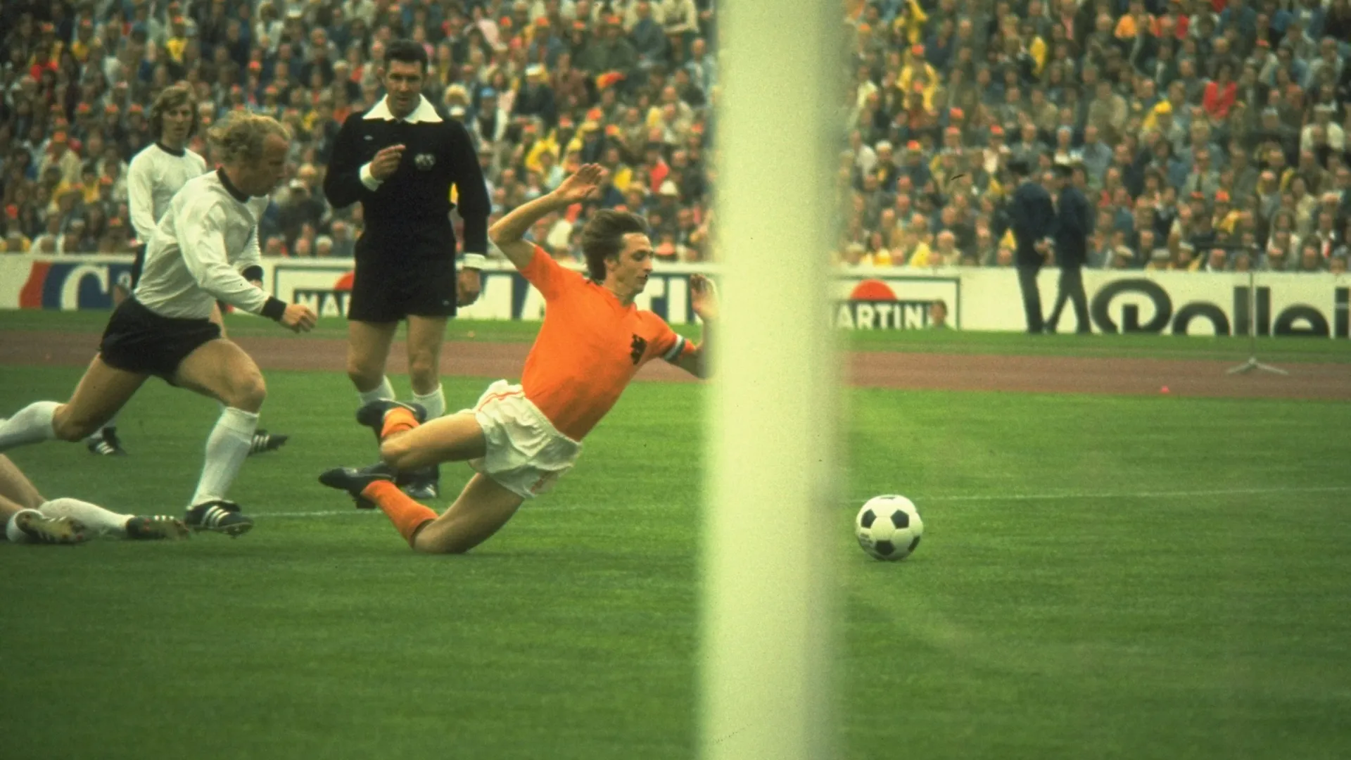 Holland player Johan Cruyff is tripped by Uli Hoeness of Germany for a penalty kick. Allsport UK /Allsport