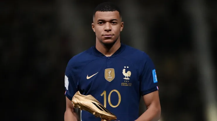 Kylian Mbappe of France poses with the adidas Golden Boot trophy
