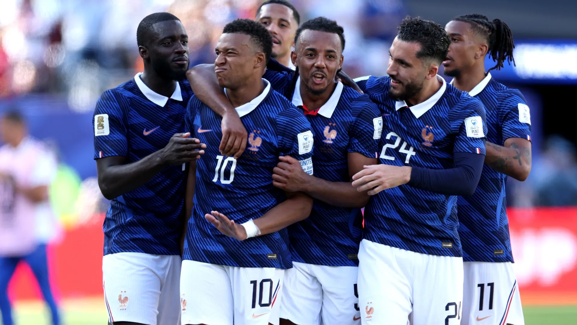 Kylian Mbappe #10 of France celebrates with teammates. Dan Mullan/Getty Images