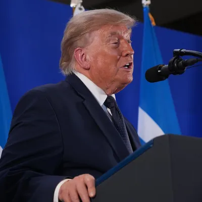 Why is Donald Trump presenting the 2026 FIFA World Cup trophy?
