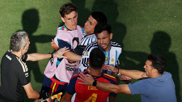 Leandro Paredes #5 of Argentina and Eric Garcia #4 of Spain.