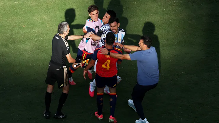 Leandro Paredes #5 of Argentina and Eric Garcia #4 of Spain have words.
