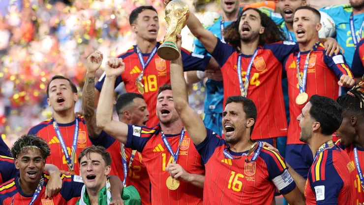 Rodri #16 of Spain lifts the FIFA World Cup Winner’s Trophy.