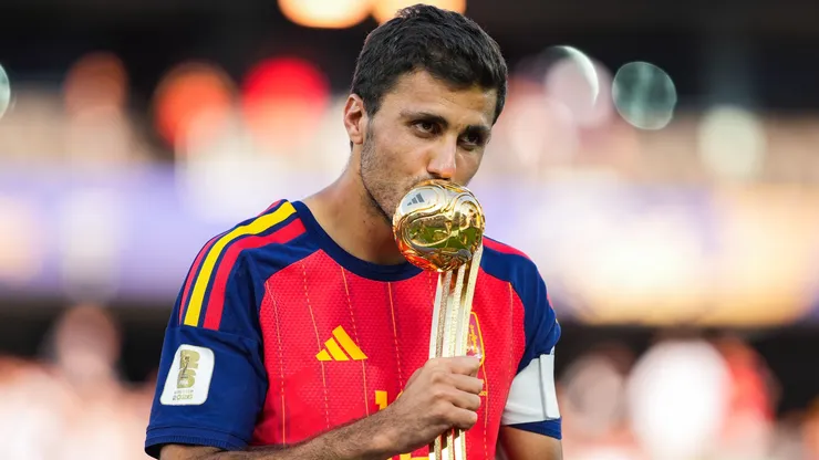 Rodri #16 of Spain kisses the Golden Ball award after the FIFA World Cup 2026 Final match.