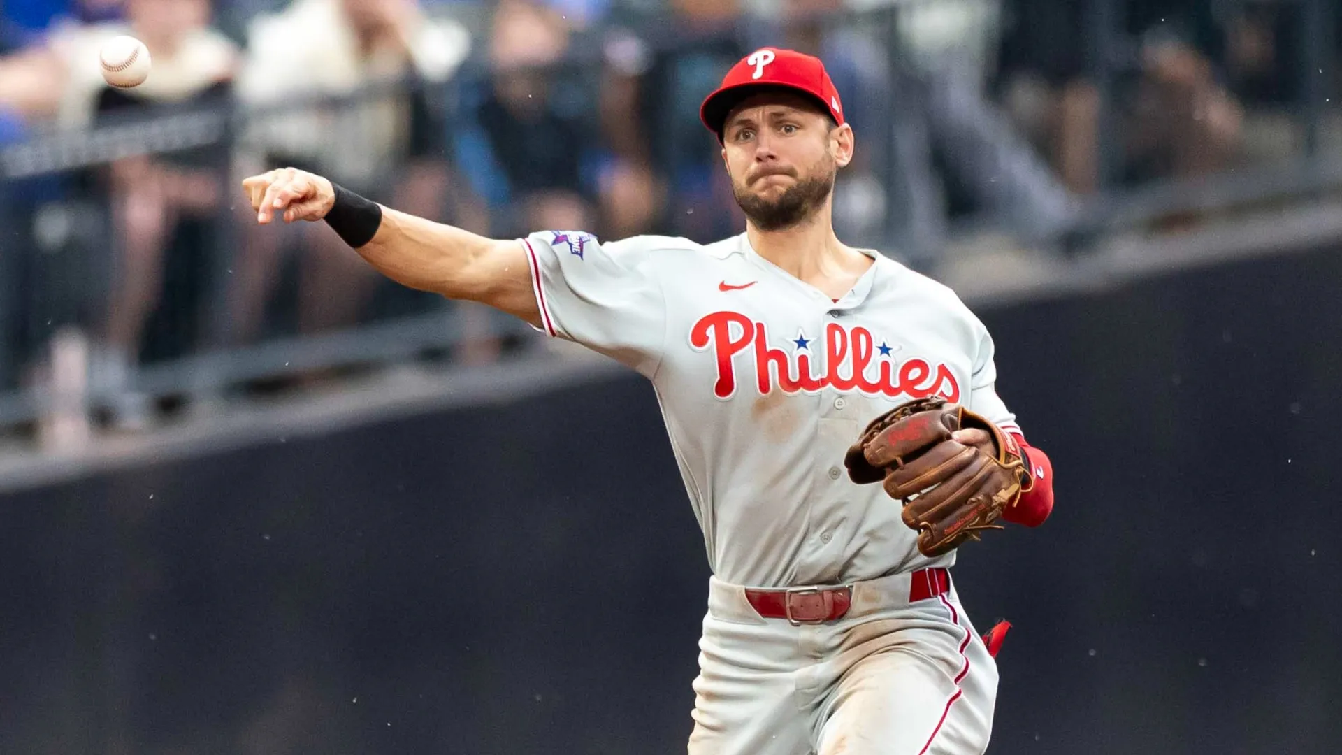 Trea Turner #7 of the Philadelphia Phillies throws to first base. Caleb Bowlin/Getty Images