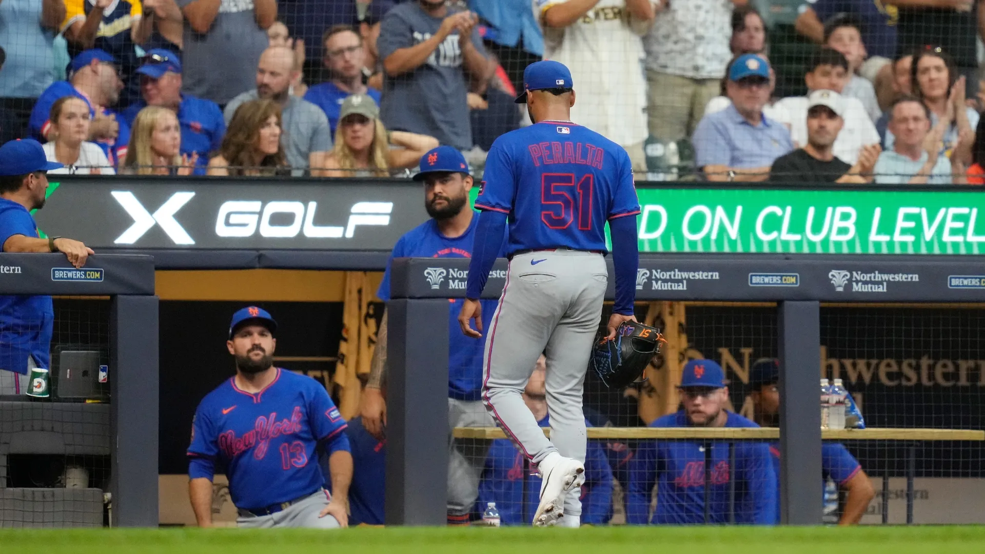 Freddy Peralta #51 of the Mets is taken out of game. John Fisher/Getty Images
