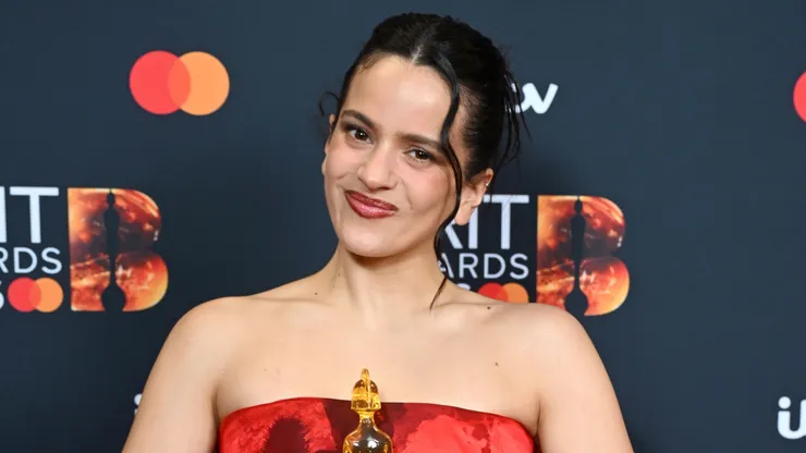 Rosalía poses with the Brit Award for International Artist.